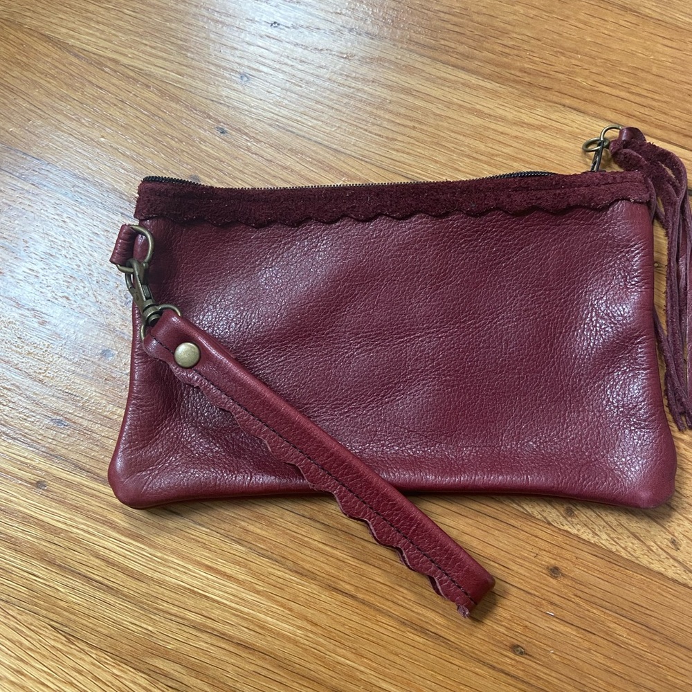 All leather wine colored wristlet/wallet by Lara B.